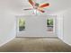 Spacious main bedroom with neutral walls and carpeting at 3853 Cress Way Dr, Decatur, GA 30034