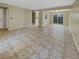 Spacious living area with tile floors and open layout at 707 Pine Tree Trl # 10B, Atlanta, GA 30349