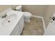 Clean bathroom with white vanity and tile floor at 707 Pine Tree Trl # 10B, Atlanta, GA 30349