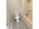 Simple bathroom with a toilet and tub shower at 707 Pine Tree Trl # 10B, Atlanta, GA 30349