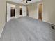 Large main bedroom with grey carpet and walk-in closets at 707 Pine Tree Trl # 10B, Atlanta, GA 30349