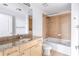 Bathroom with granite countertop, tub and shower at 3324 Peachtree Ne Rd # 2518, Atlanta, GA 30326