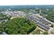 Aerial view of community with townhouses and green space at 276 Thompson St, Alpharetta, GA 30009