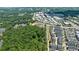 Aerial view of community with townhouses and green space at 276 Thompson St, Alpharetta, GA 30009