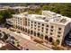 Aerial view of a classic-style hotel building on a city street at 276 Thompson St, Alpharetta, GA 30009