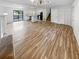 Open concept living room features hardwood floors and an island kitchen at 5351 Zachary Dr, Stone Mountain, GA 30083