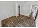 Bright bedroom with wood-look vinyl flooring and a large closet at 5351 Zachary Dr, Stone Mountain, GA 30083