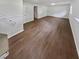 Finished basement with neutral walls and hardwood floors at 5351 Zachary Dr, Stone Mountain, GA 30083