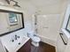 Updated bathroom with new vanity, toilet, and tub at 5351 Zachary Dr, Stone Mountain, GA 30083
