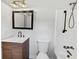 Updated bathroom with a modern vanity and shower at 5351 Zachary Dr, Stone Mountain, GA 30083