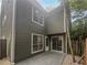 Exterior view of townhouse with patio at 1097 Rock Creek Ln, Norcross, GA 30093
