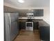 Modern kitchen with stainless steel appliances at 1097 Rock Creek Ln, Norcross, GA 30093