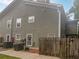 Townhouse exterior with fenced yard at 1097 Rock Creek Ln, Norcross, GA 30093