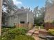 Townhouse exterior with walkway and fence at 1097 Rock Creek Ln, Norcross, GA 30093