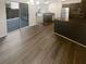 Eat-in kitchen with dark cabinets and island at 1097 Rock Creek Ln, Norcross, GA 30093