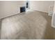 Living room with fireplace and neutral carpeting at 1097 Rock Creek Ln, Norcross, GA 30093