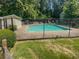 Community swimming pool with surrounding deck at 1097 Rock Creek Ln, Norcross, GA 30093
