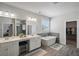 Elegant bathroom with double vanity and soaking tub at 41 Foxcroft Way, Villa Rica, GA 30180