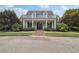 Elegant community clubhouse with columns and balcony at 41 Foxcroft Way, Villa Rica, GA 30180