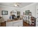 Elegant home office with built-in shelving and hardwood floors at 41 Foxcroft Way, Villa Rica, GA 30180