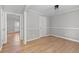Light-filled dining room with hardwood floors and neutral walls at 10100 Clearview Nw Dr, Covington, GA 30014