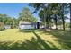 House with a large backyard and trees at 10100 Clearview Nw Dr, Covington, GA 30014