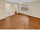 Spacious bedroom with en-suite bathroom and hardwood floors at 309 Quail Run, Roswell, GA 30076