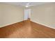 Bright bedroom with hardwood floors and ample closet space at 309 Quail Run, Roswell, GA 30076