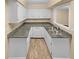 Modern kitchen with granite countertops and white cabinets at 309 Quail Run, Roswell, GA 30076