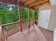 Deck overlooking wooded area with storage at 309 Quail Run, Roswell, GA 30076