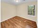 Bedroom with hardwood floors and window at 309 Quail Run, Roswell, GA 30076