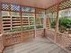 Relaxing screened porch with wooden flooring at 309 Quail Run, Roswell, GA 30076