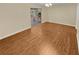 Dining room with wood flooring and access to a patio at 309 Quail Run, Roswell, GA 30076