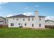 Two story house with a large backyard and patio at 1760 Waterton Ln, Lithonia, GA 30058