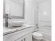 Modern bathroom with a vessel sink and white vanity at 1760 Waterton Ln, Lithonia, GA 30058