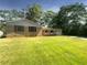 Ranch style home with a nicely landscaped yard at 4128 Snapfinger Way, Decatur, GA 30035