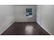 Spacious bedroom with hardwood floors and a window at 4128 Snapfinger Way, Decatur, GA 30035