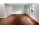 Bright living room with hardwood floors and large windows at 4128 Snapfinger Way, Decatur, GA 30035