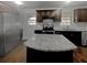 Kitchen with granite countertops, dark wood cabinets, and stainless steel appliances at 4128 Snapfinger Way, Decatur, GA 30035