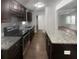 Modern kitchen with granite countertops and dark wood cabinets at 4128 Snapfinger Way, Decatur, GA 30035