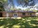 Spacious backyard with large grass area and mature trees at 4128 Snapfinger Way, Decatur, GA 30035