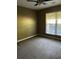 Bright bedroom with large window and ceiling fan at 9184 S Sterling Lakes S Dr, Covington, GA 30014