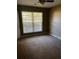 Spacious bedroom with large window and ceiling fan at 9184 S Sterling Lakes S Dr, Covington, GA 30014