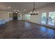 Bright dining room featuring hardwood floors and chandelier at 1147 Red Oak Blvd, Loganville, GA 30052