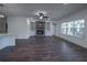 Spacious living room with fireplace and hardwood floors at 1147 Red Oak Blvd, Loganville, GA 30052