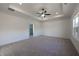 Large main bedroom with plush carpet and ensuite bathroom at 1147 Red Oak Blvd, Loganville, GA 30052