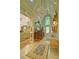 Elegant entryway with chandelier, ornate mirror, and tiled floor at 2341 Habersham Sw Dr, Marietta, GA 30064