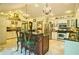 Bright kitchen with granite counters, custom cabinets, and breakfast bar at 2341 Habersham Sw Dr, Marietta, GA 30064