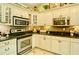 Modern kitchen with granite countertops and updated appliances at 2341 Habersham Sw Dr, Marietta, GA 30064