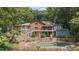 Elegant home with a pool and stonework, nestled in a wooded area at 2341 Habersham Sw Dr, Marietta, GA 30064